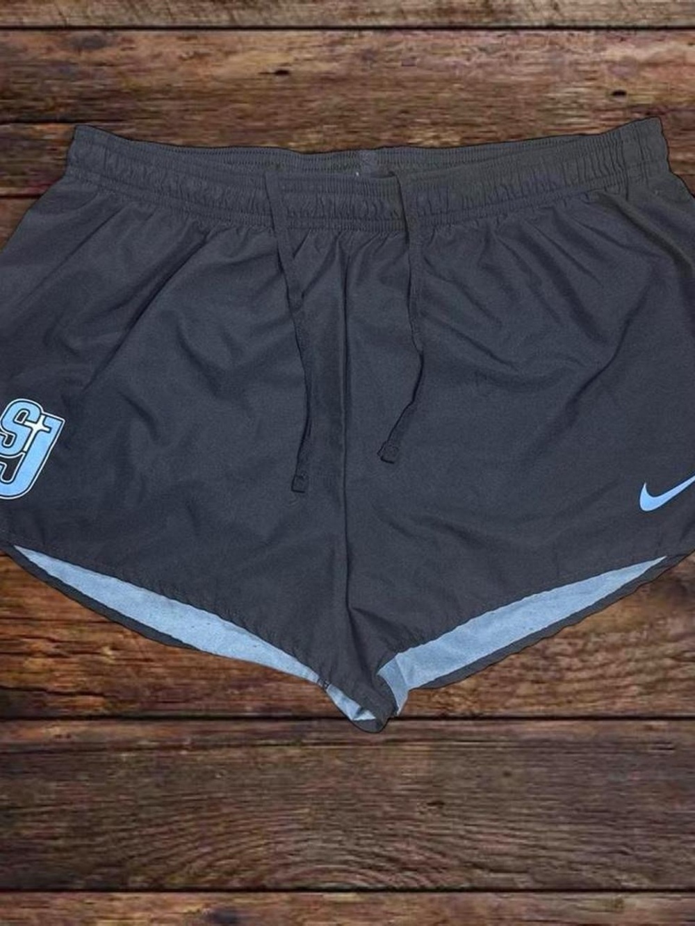 Nike Women's Black Athletic Shorts with Light Blue Trim